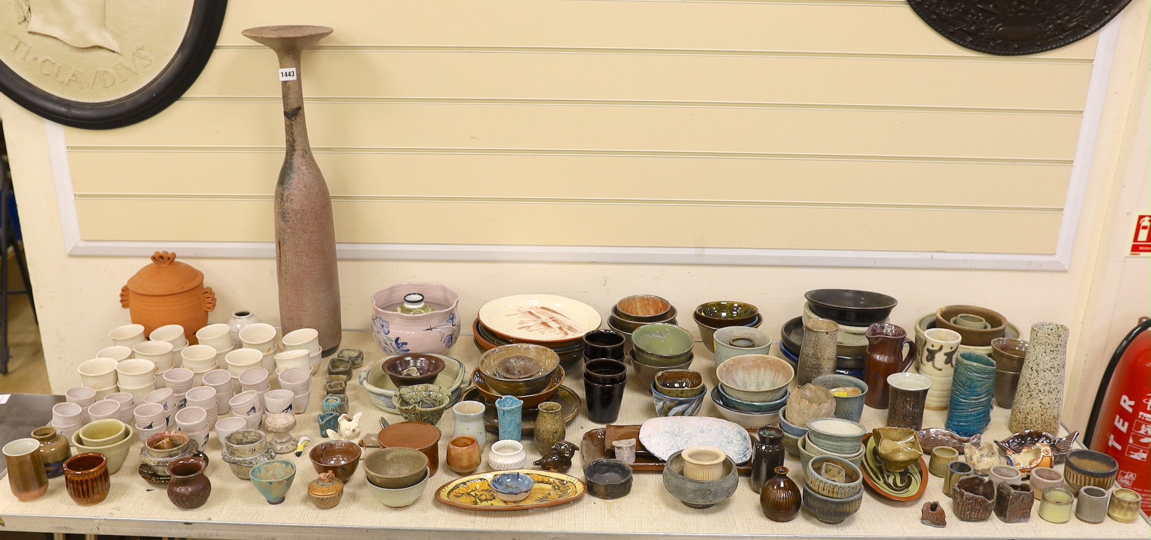 A large quantity of Susan Threadgold tall pottery bottle vase, eggcups, bowls, plates, vases etc, bottle vase 54cms high.